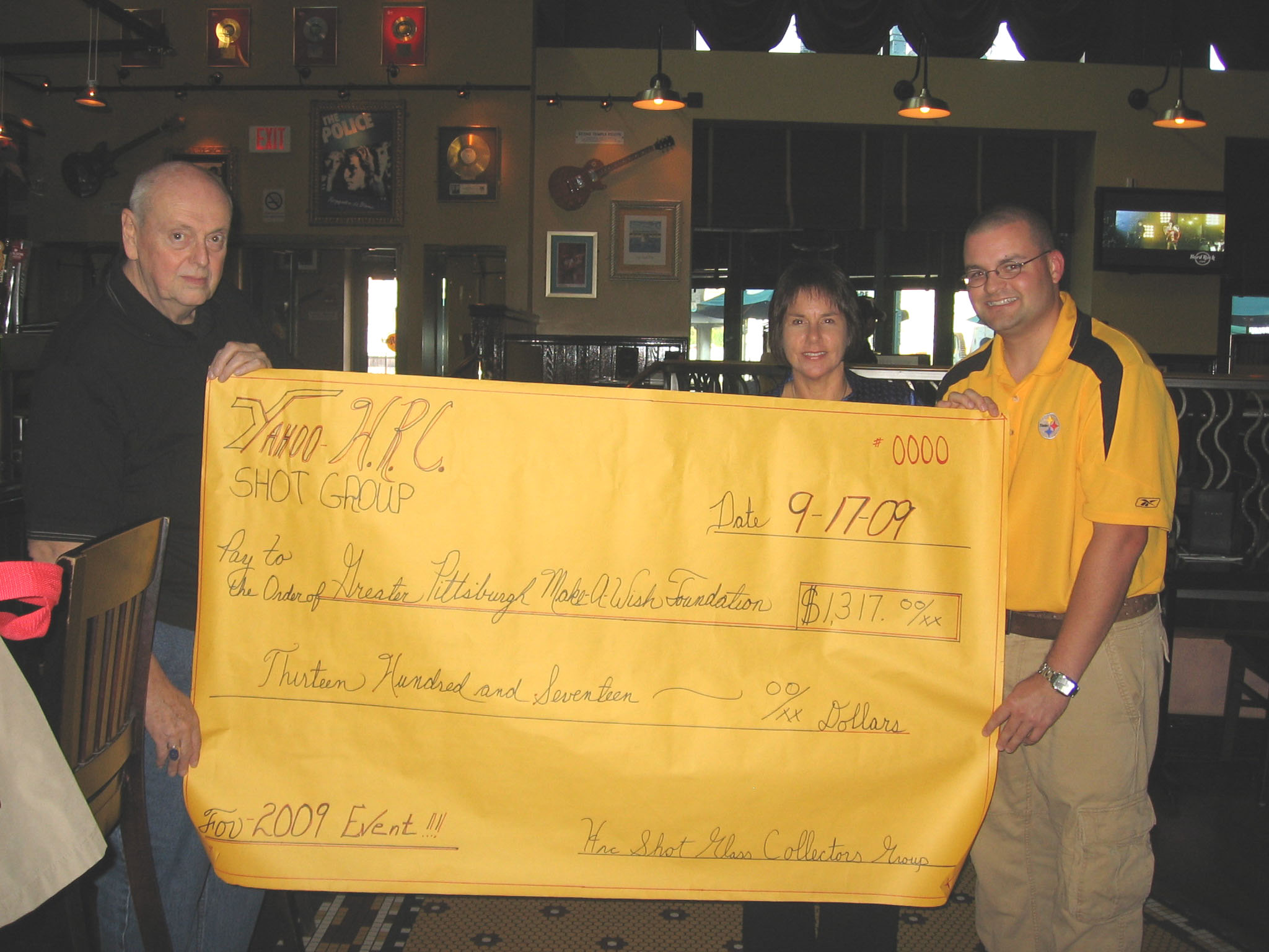 Frank and Brian present the donation